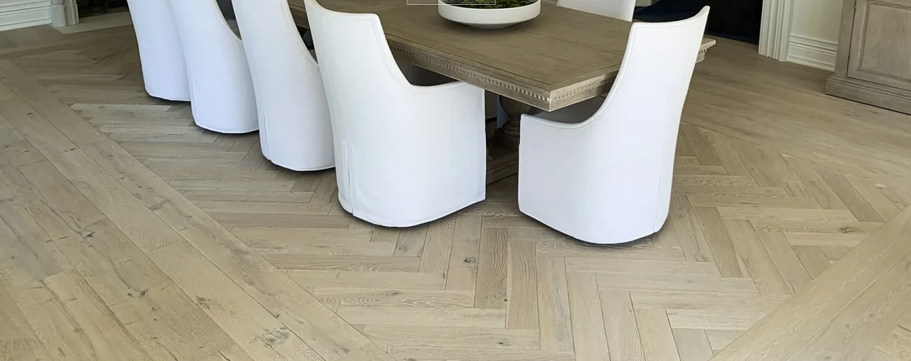 Custom bordered herringbone hardwood pattern